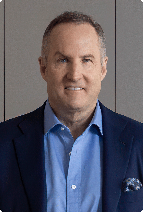 Chris Meany, smiling in a professional headshot
